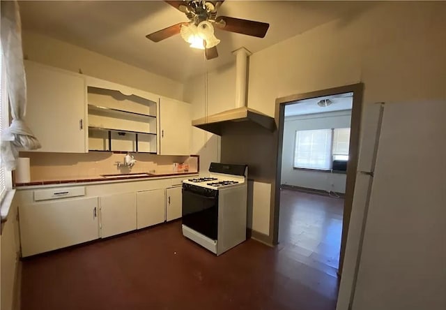 kitchen featuring white cabinetry, sink, ceiling fan, and white appliances