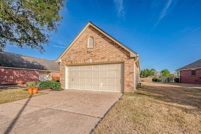 view of front of property with a garage, concrete driveway, brick siding, and a front lawn