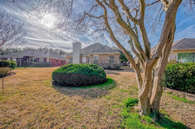 view of yard with fence