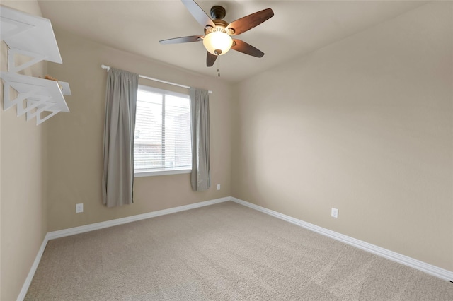 empty room with carpet floors and ceiling fan