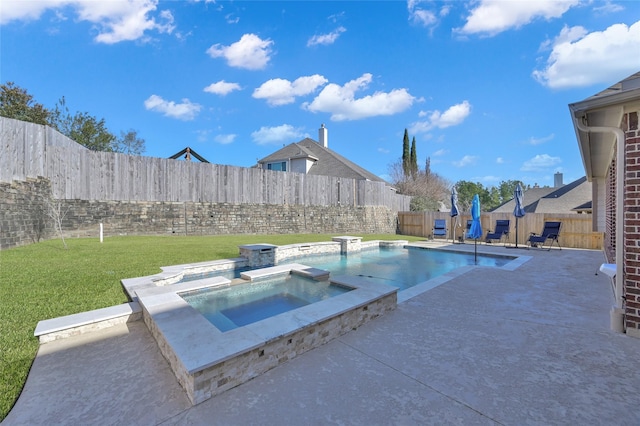 view of swimming pool featuring an in ground hot tub, a patio area, and a lawn