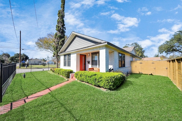 view of front of home with a front yard