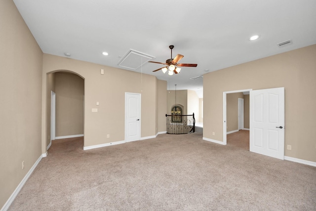 carpeted empty room with ceiling fan