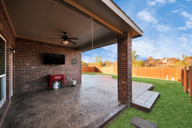 view of patio / terrace featuring ceiling fan