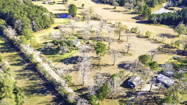 drone / aerial view with a rural view and a water view