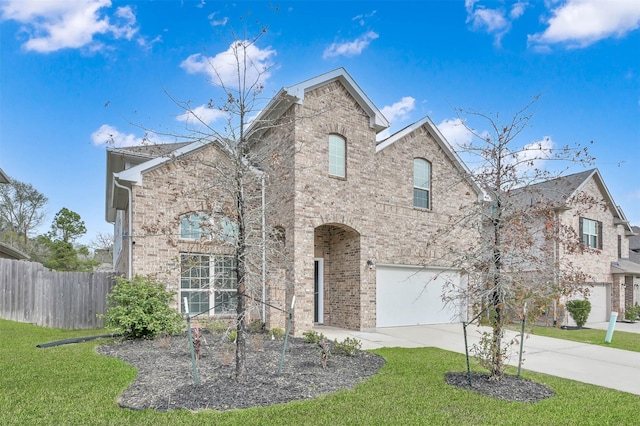 front facade with a front yard and a garage