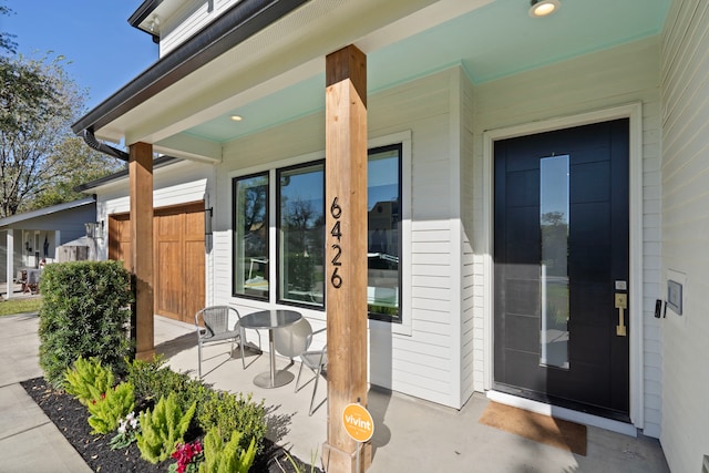 doorway to property with covered porch