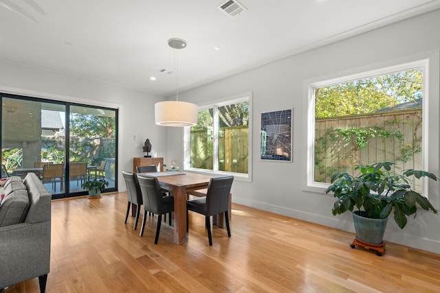 dining room featuring light wood-type flooring