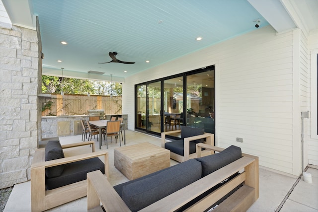 view of patio / terrace with ceiling fan, an outdoor hangout area, and a grill