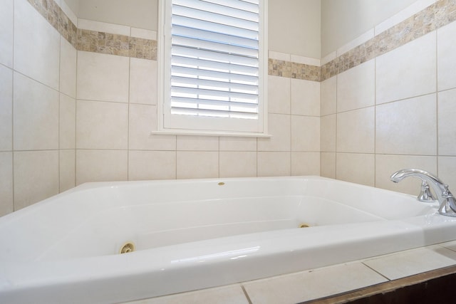 bathroom featuring a washtub