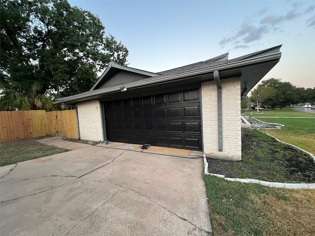 garage featuring fence