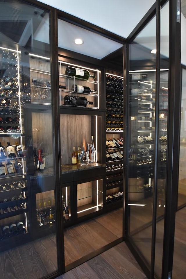 wine cellar featuring wood finished floors