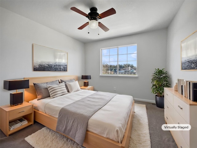 carpeted bedroom with ceiling fan