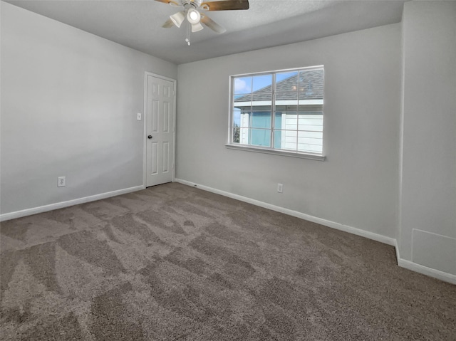 carpeted empty room with ceiling fan