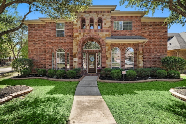 view of front facade with a front yard