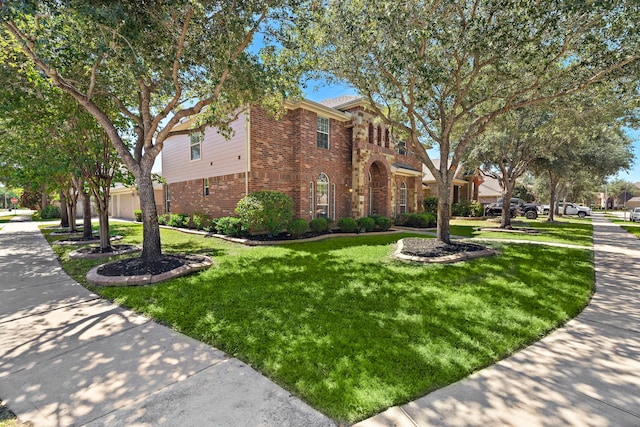 view of side of property with a yard