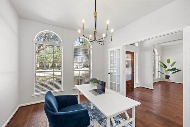 home office featuring a notable chandelier, plenty of natural light, and dark wood-type flooring