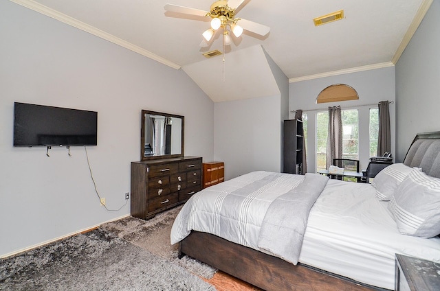 bedroom with carpet, vaulted ceiling, ceiling fan, and ornamental molding