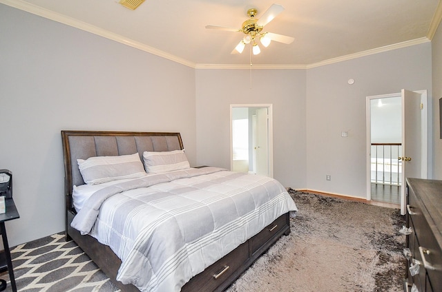 bedroom featuring carpet, ceiling fan, and ornamental molding