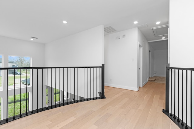 hallway with light wood-type flooring