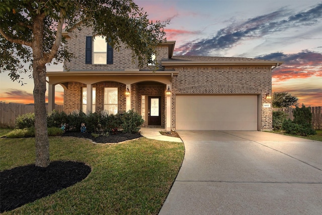 view of front of property with a yard