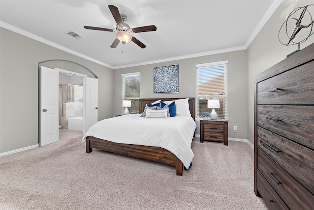 bedroom featuring connected bathroom, ceiling fan, crown molding, multiple windows, and light carpet