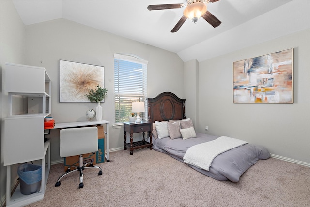 carpeted bedroom with ceiling fan and lofted ceiling