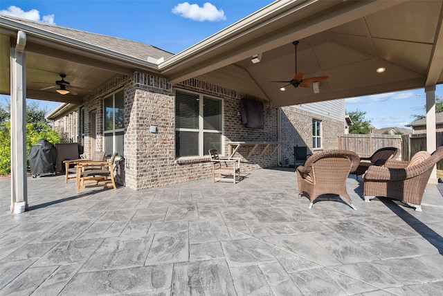 view of patio / terrace with ceiling fan and grilling area