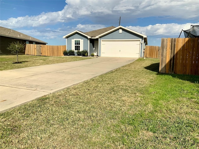 ranch-style house featuring a garage and a front yard