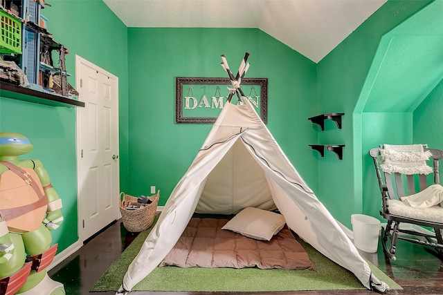 game room with vaulted ceiling