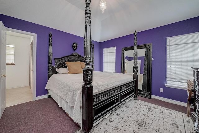 bedroom featuring light carpet and multiple windows