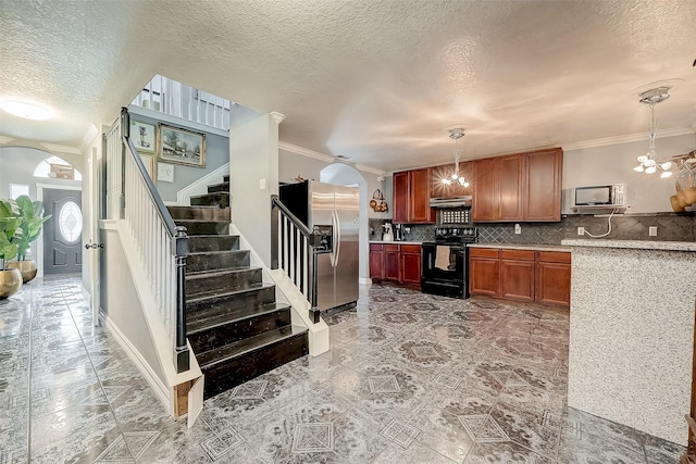 kitchen featuring an inviting chandelier, decorative backsplash, ornamental molding, a textured ceiling, and appliances with stainless steel finishes