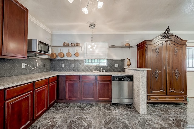 kitchen featuring a wealth of natural light, sink, stainless steel appliances, backsplash, and pendant lighting