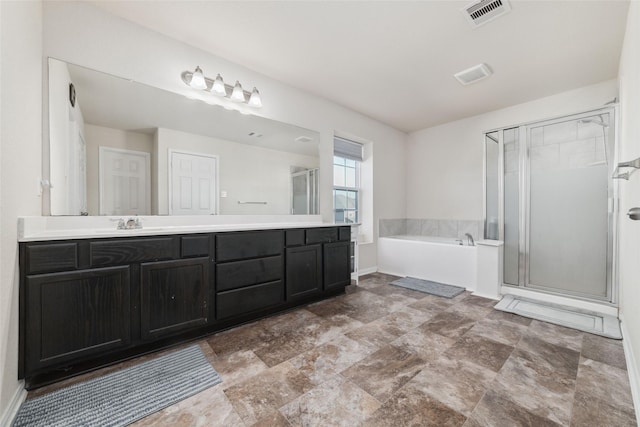 bathroom with vanity and plus walk in shower