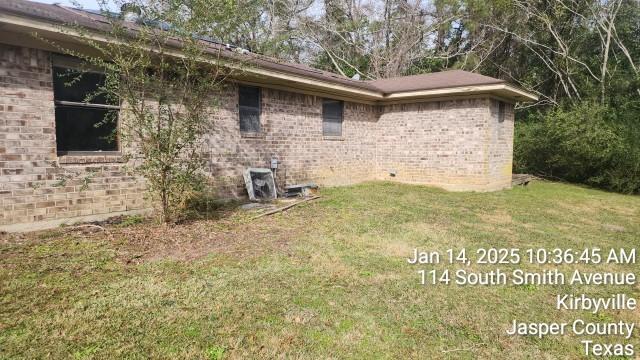 view of property exterior featuring a yard