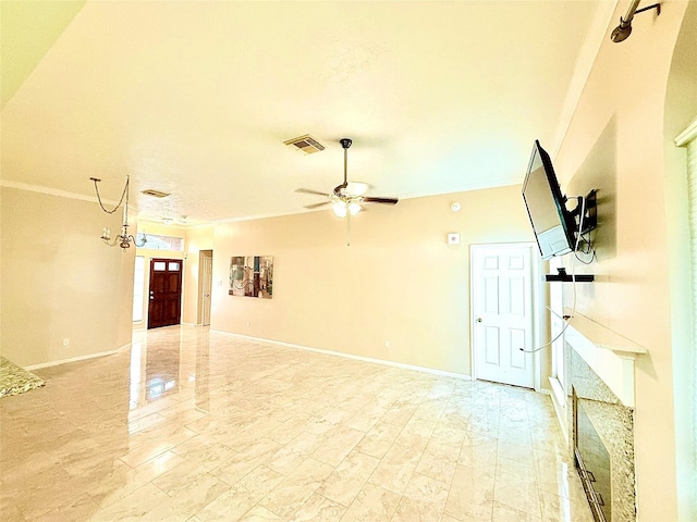 empty room with crown molding and ceiling fan with notable chandelier