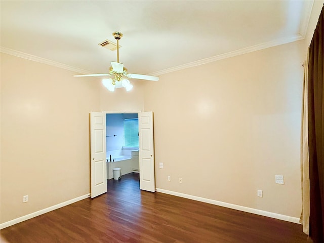 unfurnished bedroom with ceiling fan, dark wood-type flooring, and ornamental molding