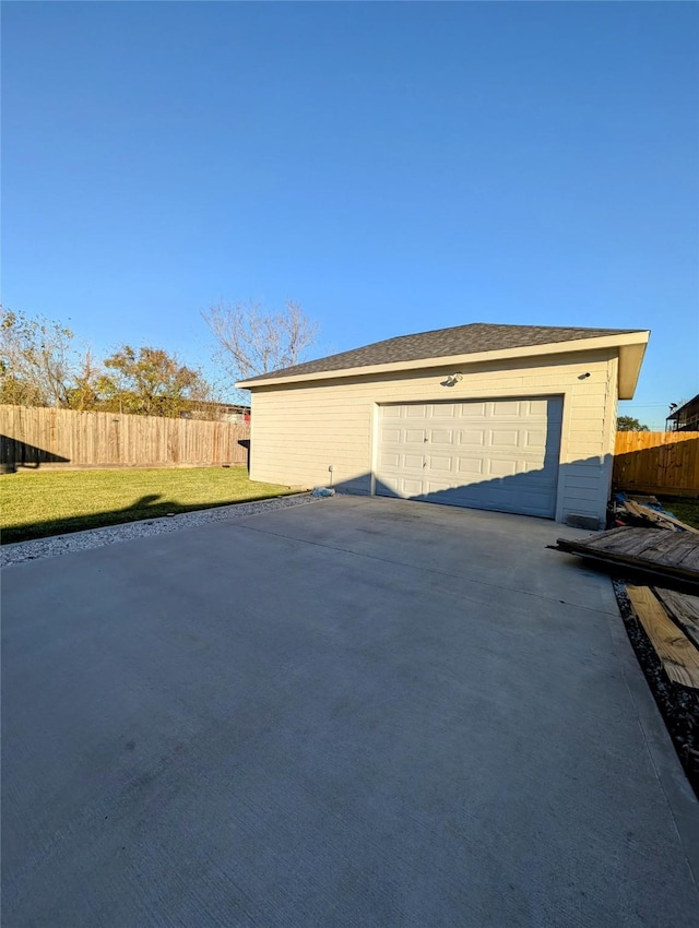 garage with a lawn