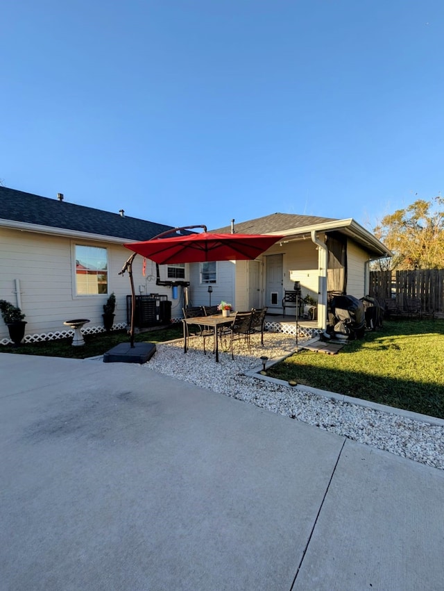 exterior space with a yard and a patio