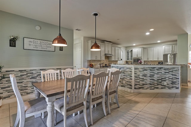 view of tiled dining space