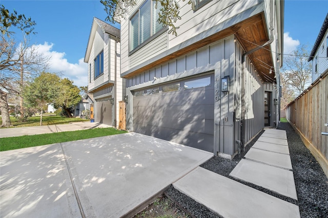 view of side of property featuring a garage