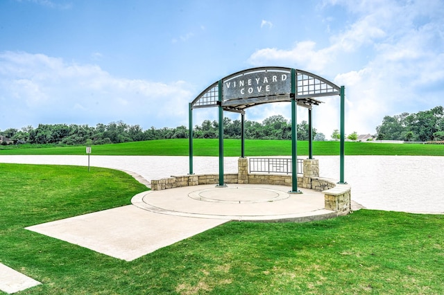 view of basketball court with a yard