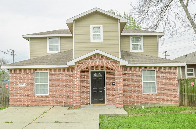 front facade with a patio area