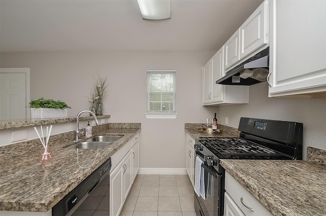 kitchen featuring white cabinets, stone counters, black appliances, and sink