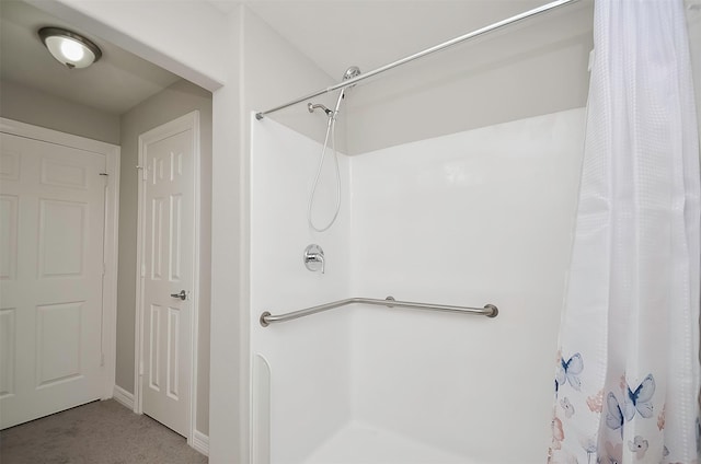 bathroom featuring walk in shower