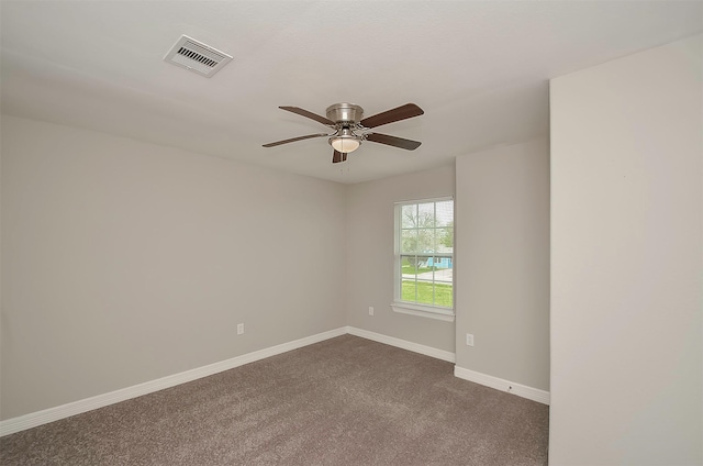 carpeted empty room with ceiling fan