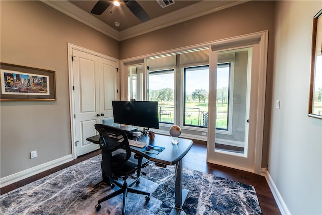 home office with crown molding, ceiling fan, and dark hardwood / wood-style floors