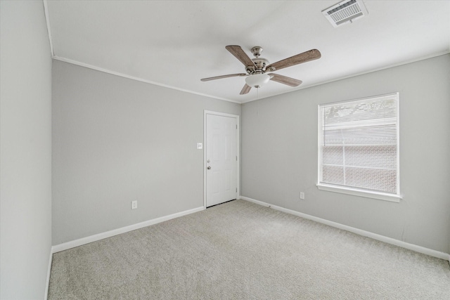 unfurnished room featuring ceiling fan and light colored carpet