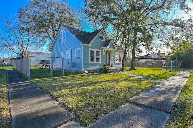 bungalow with a front yard