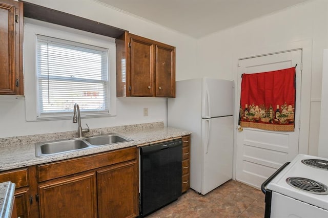 kitchen with sink and white appliances